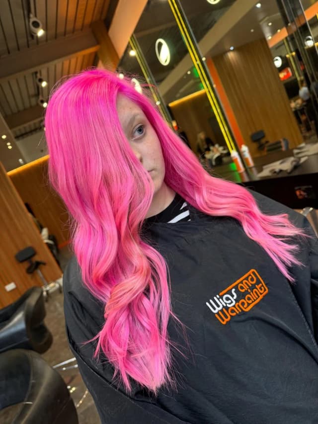 Vivid pink colour by Bella — hair transformation at Wigs & Warpaint Sheffield